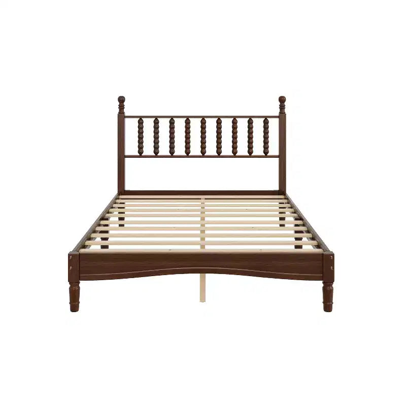 Cama de plataforma retro de madera con cabecera en forma de calabaza