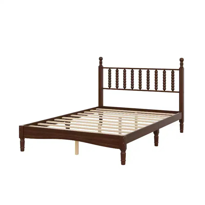 Cama de plataforma retro de madera con cabecera en forma de calabaza