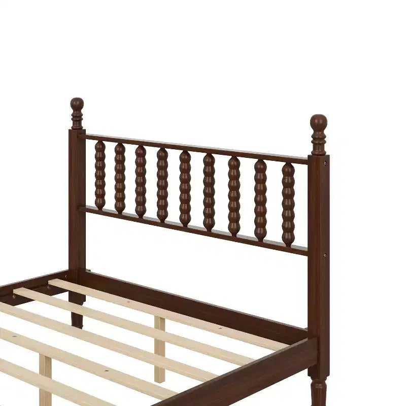 Cama de plataforma retro de madera con cabecera en forma de calabaza
