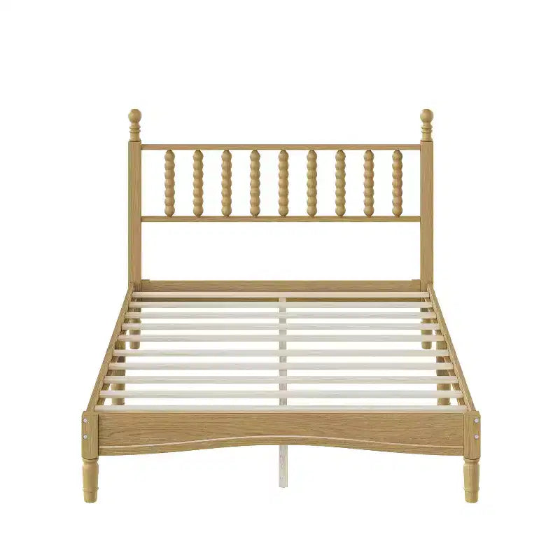 Cama de plataforma retro de madera con cabecera en forma de calabaza