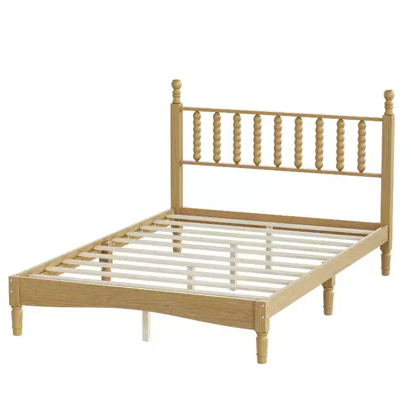 Cama de plataforma retro de madera con cabecera en forma de calabaza